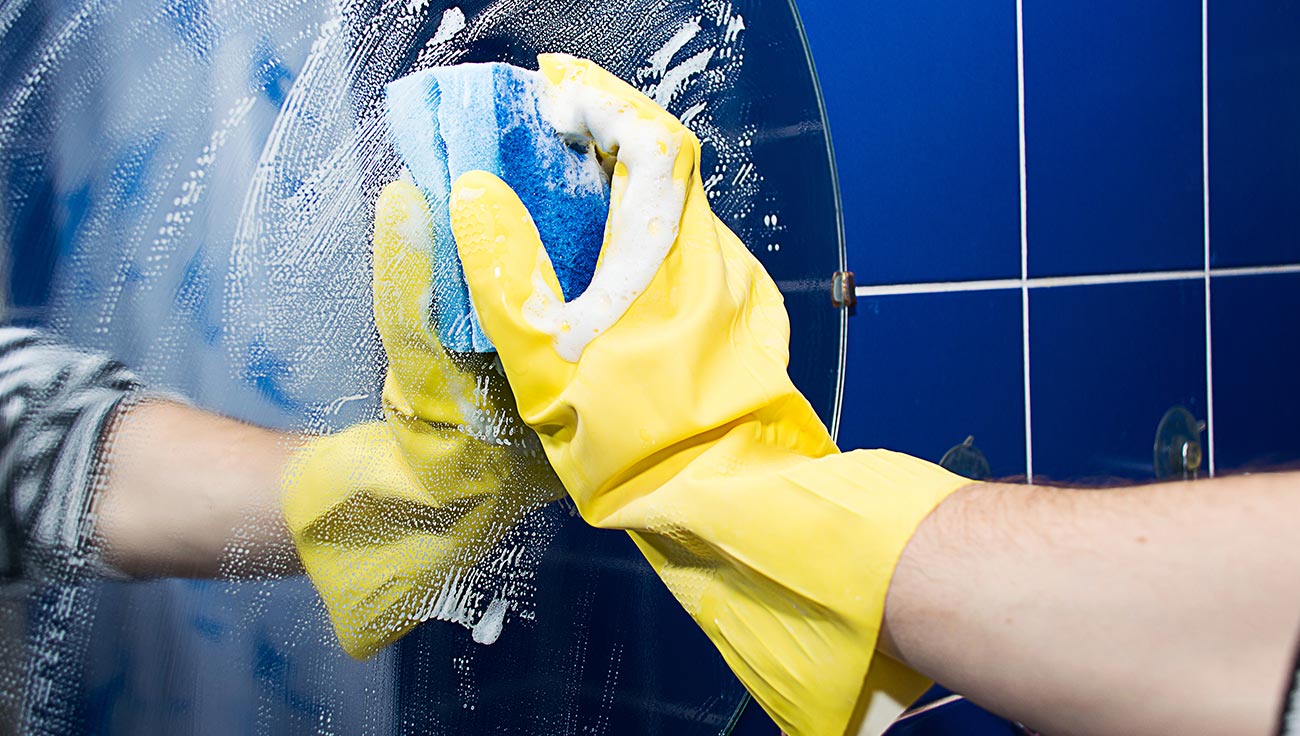 Person Washing a Mirror